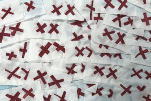Pairs of red X’s on backgrounds of white